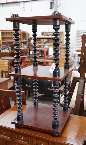 A Victorian style bobbin turned mahogany three tier whatnot, width 40cm, depth 39cm, height 86cm